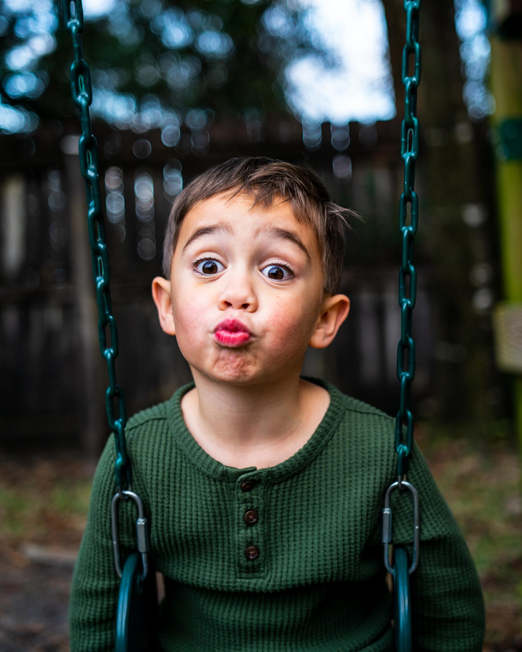 little boy making funny face