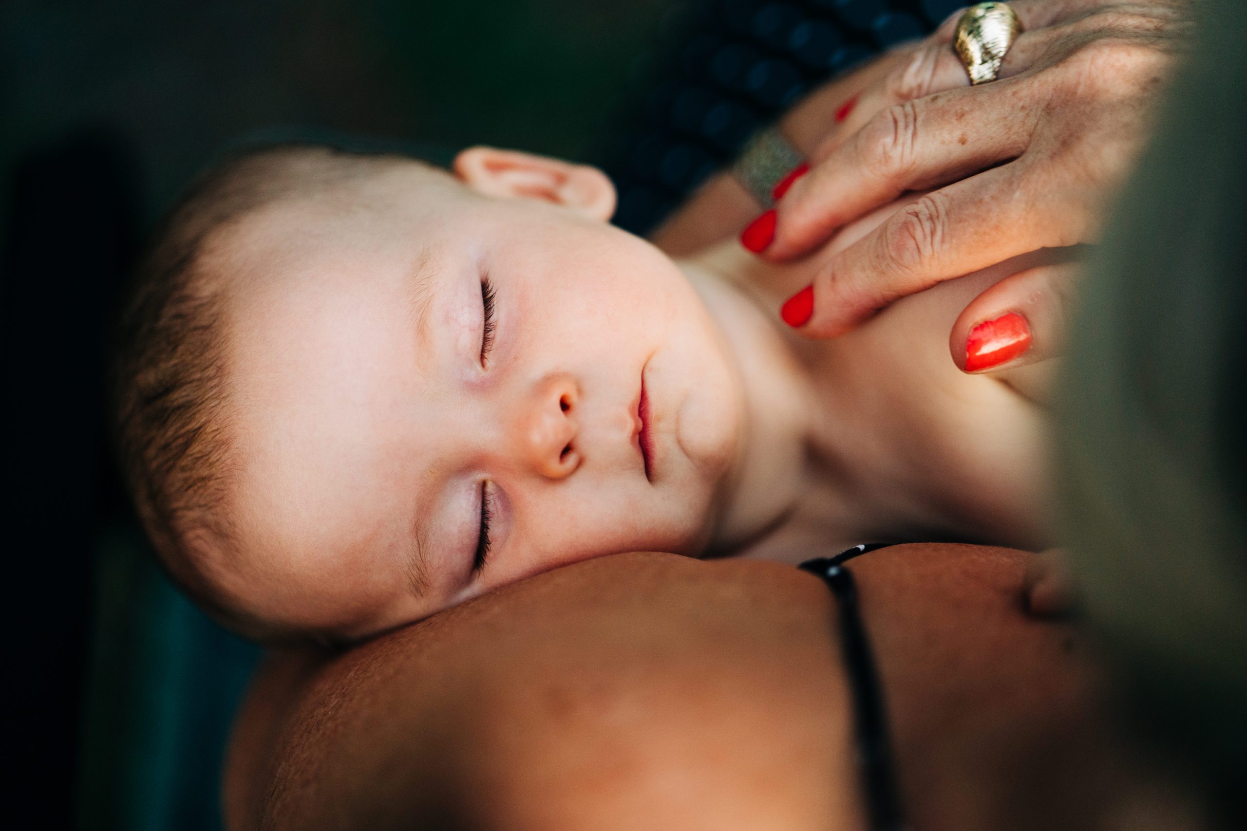 baby sleeping with grandmother