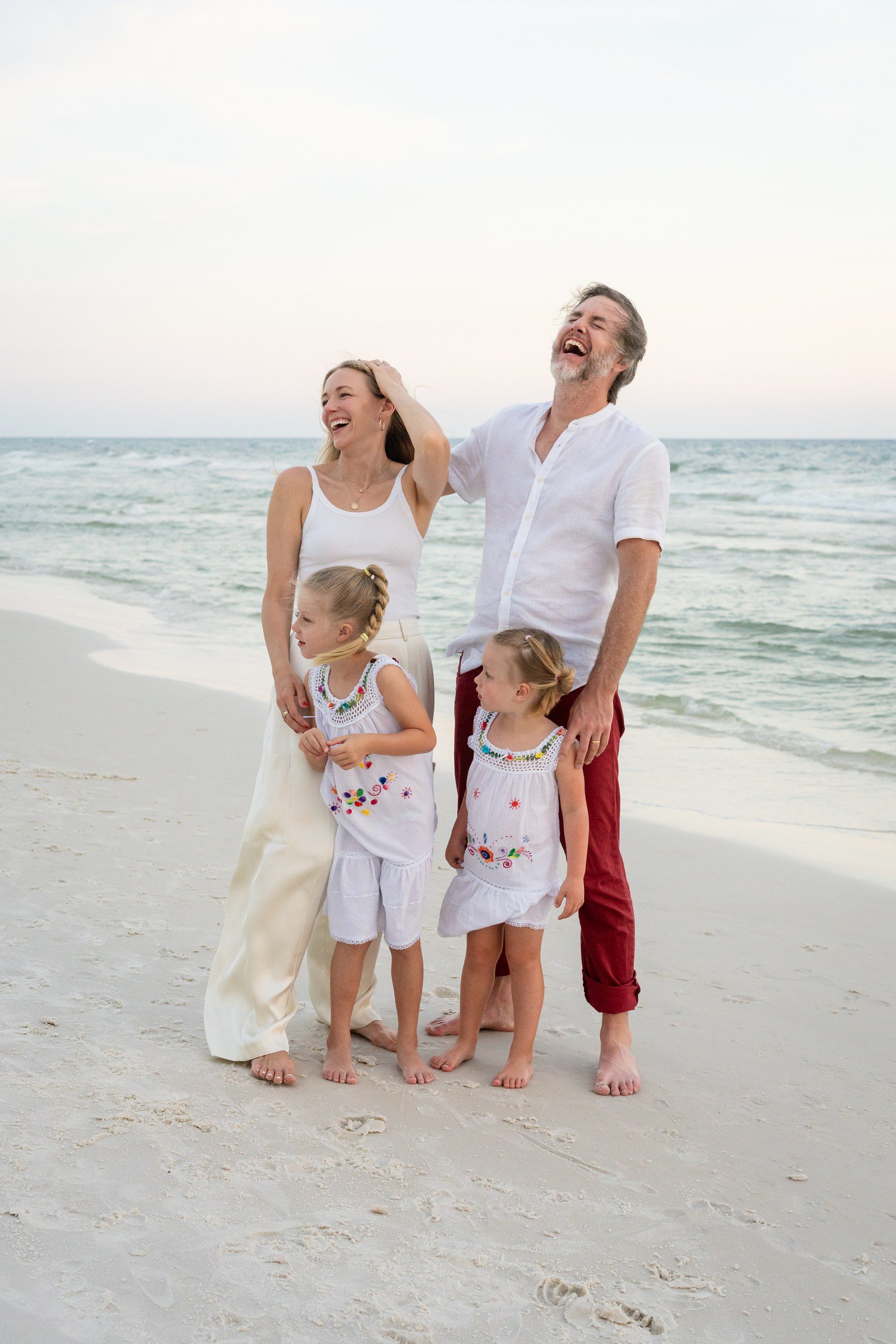 Family posing together for a classic Destin beach portrait